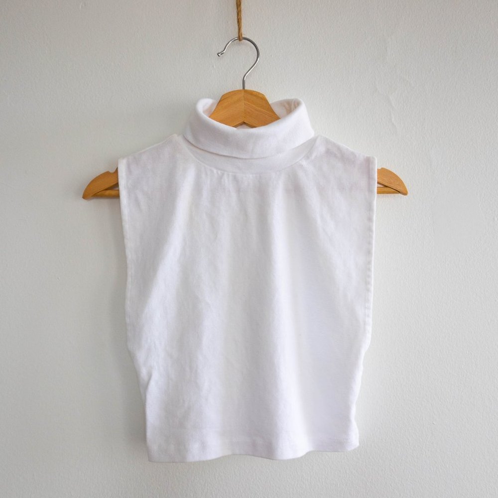 White Turtle neck No Sleeves Top